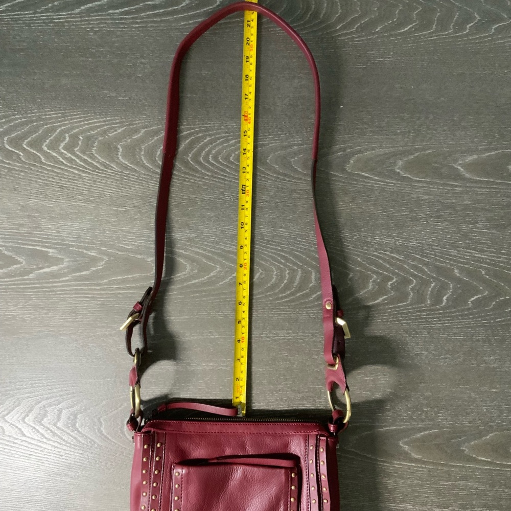 orYany Maroon Pebbled Leather Studded Crossbody - Picture 10 of 12